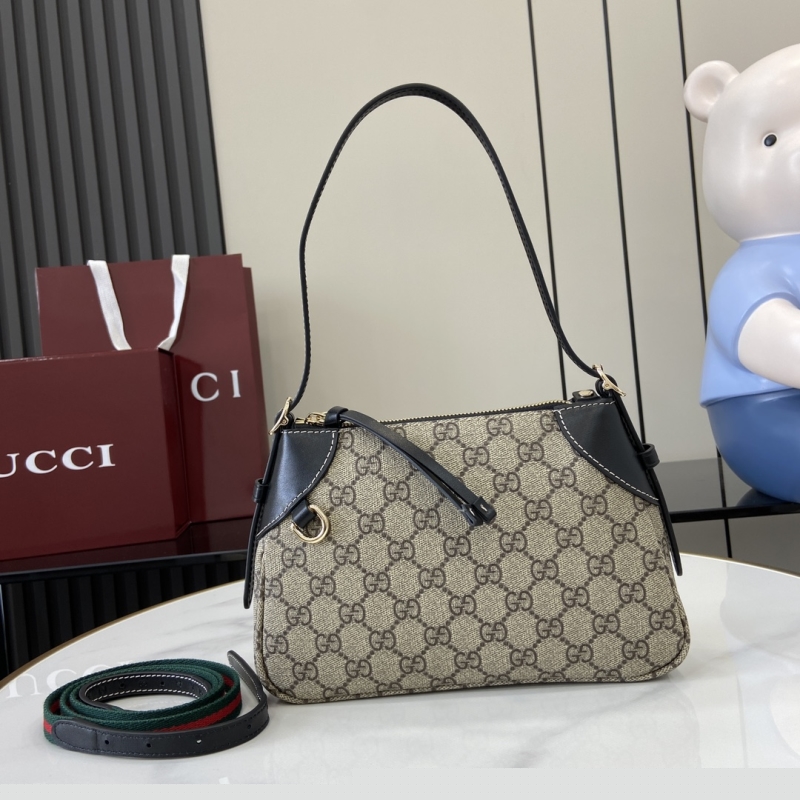 G*u*i top handle bags